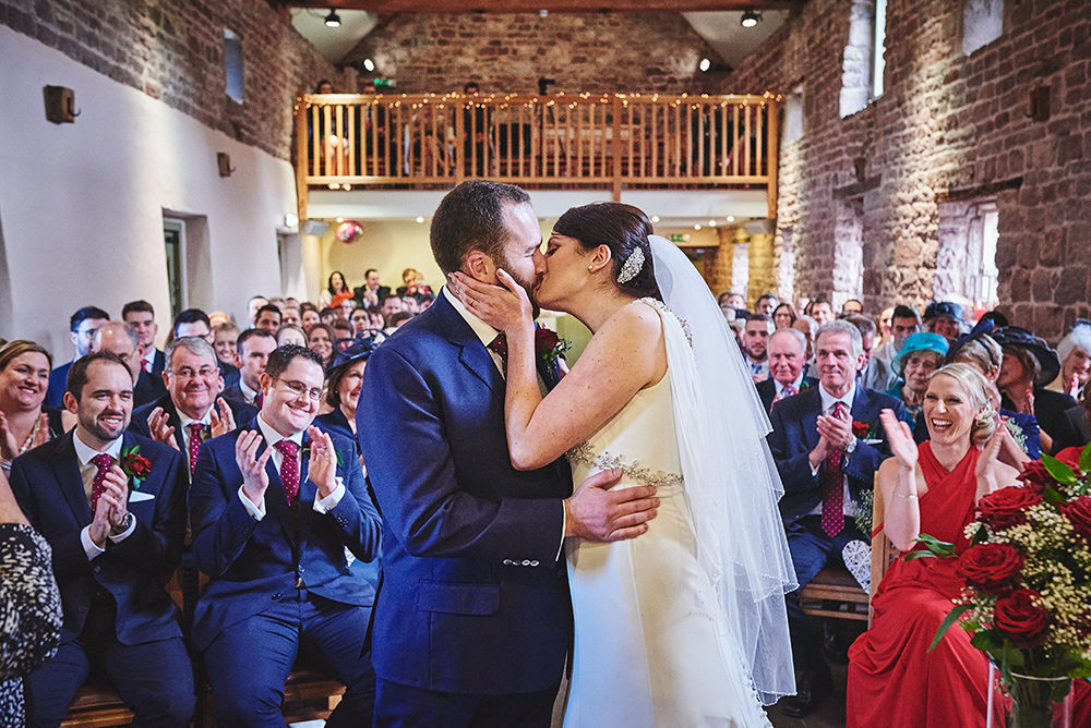 The kiss - married at The Ashes Barns