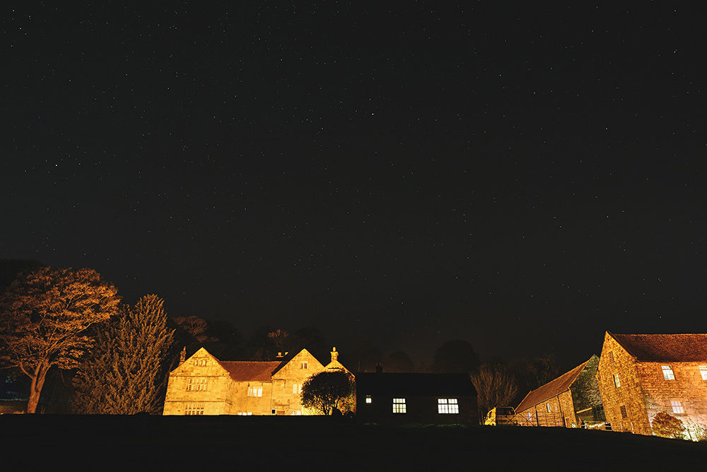 The Ashes Barns Wedding Venue at night