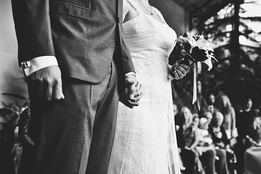 Buxton wedding - Groom and bride holding hands