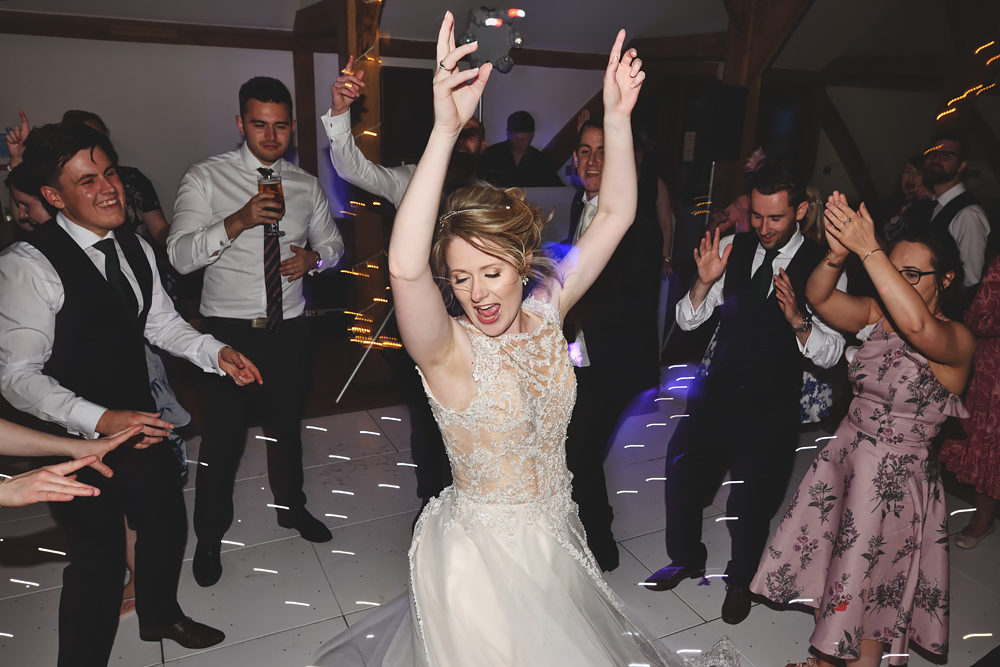 Bride on the dance floor - Sandhole Oak Barn Wedding