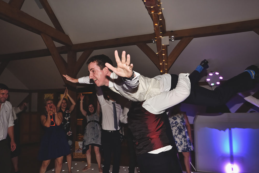Groom on the dance floor - Sandhole Oak Barn Wedding
