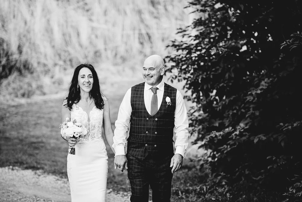 Shrigley Hall Macclesfield Wedding Photographer - Bride and groom walking