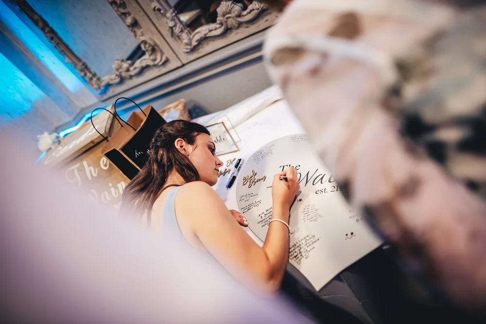 Shrigley Hall Macclesfield Wedding Photographer - Wedding guests signing board