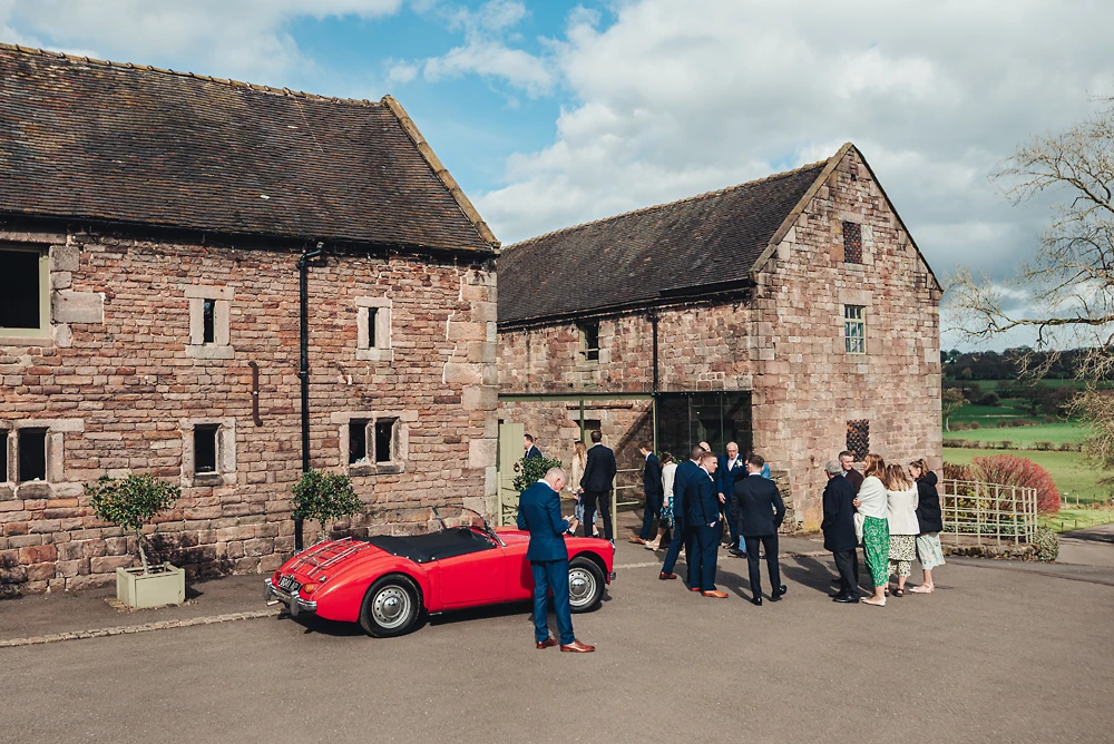 Family and friends gather before the wedding at The Ashes Barns in Staffordshire