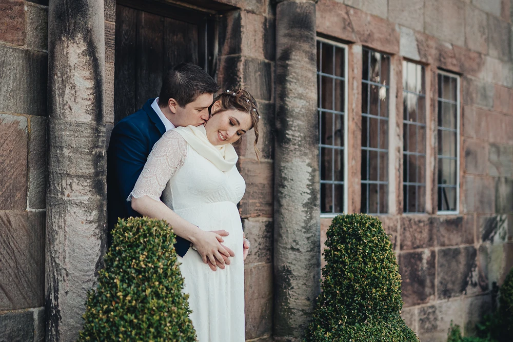 Couple portrait by the house at The Ashes Barns Staffordshire