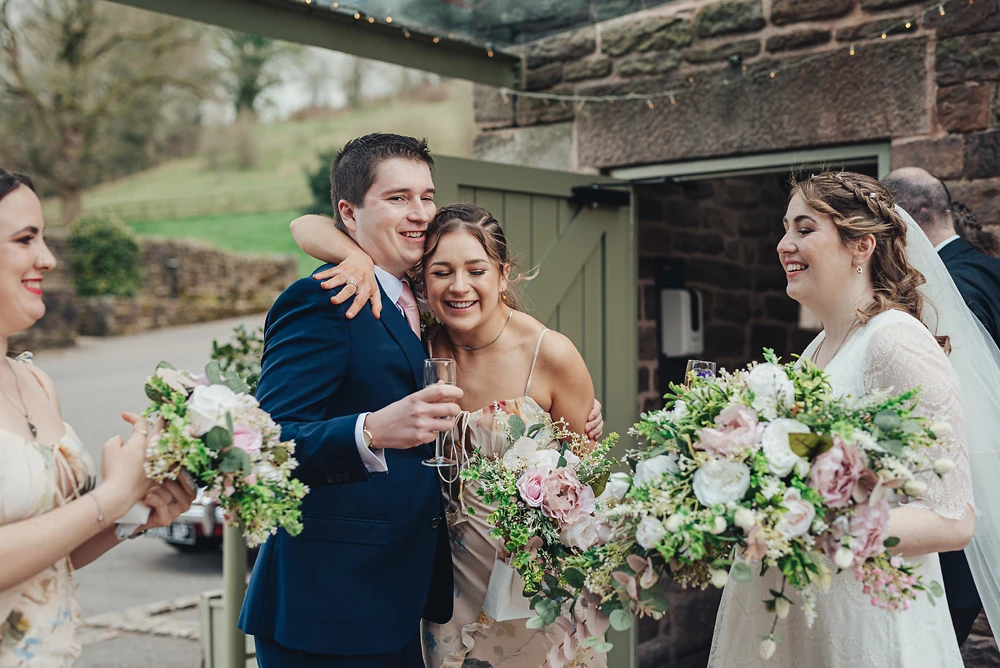 Family congratulate the bride and groom at The Ashes Barns Staffordshire