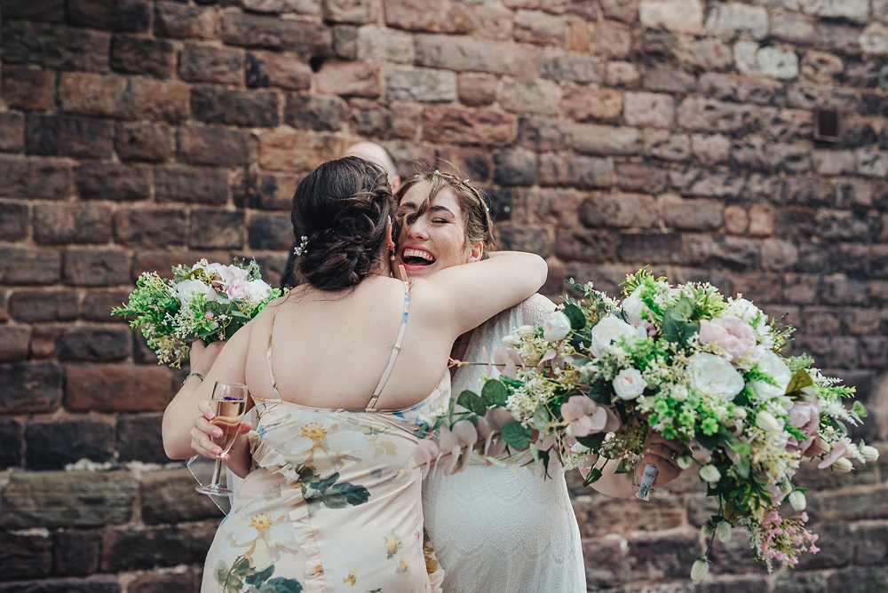 Family congratulate the bride and groom at The Ashes Barns Staffordshire