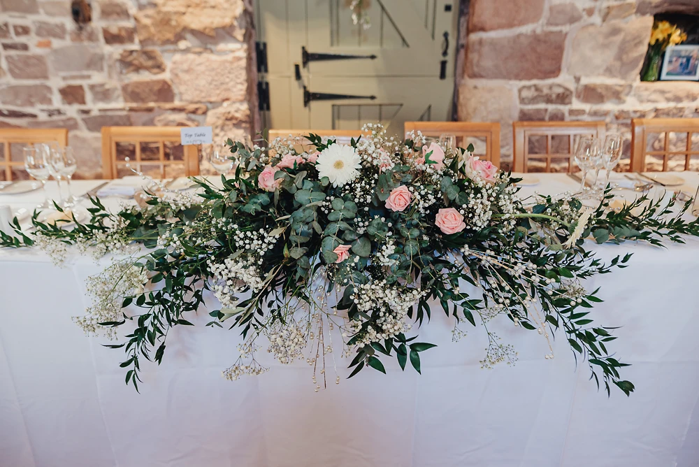 Flowers on the main table at The Ashes Barns in Staffordshire