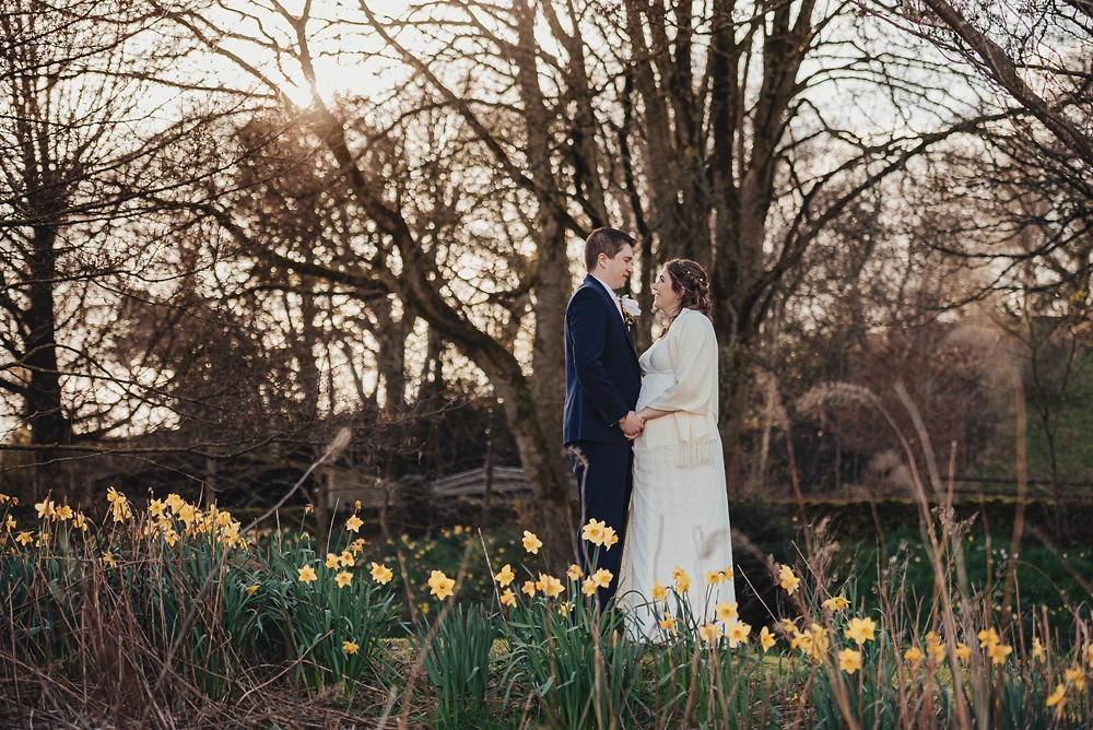 Couple portrait by the lake at The Ashes Barns Staffordshire